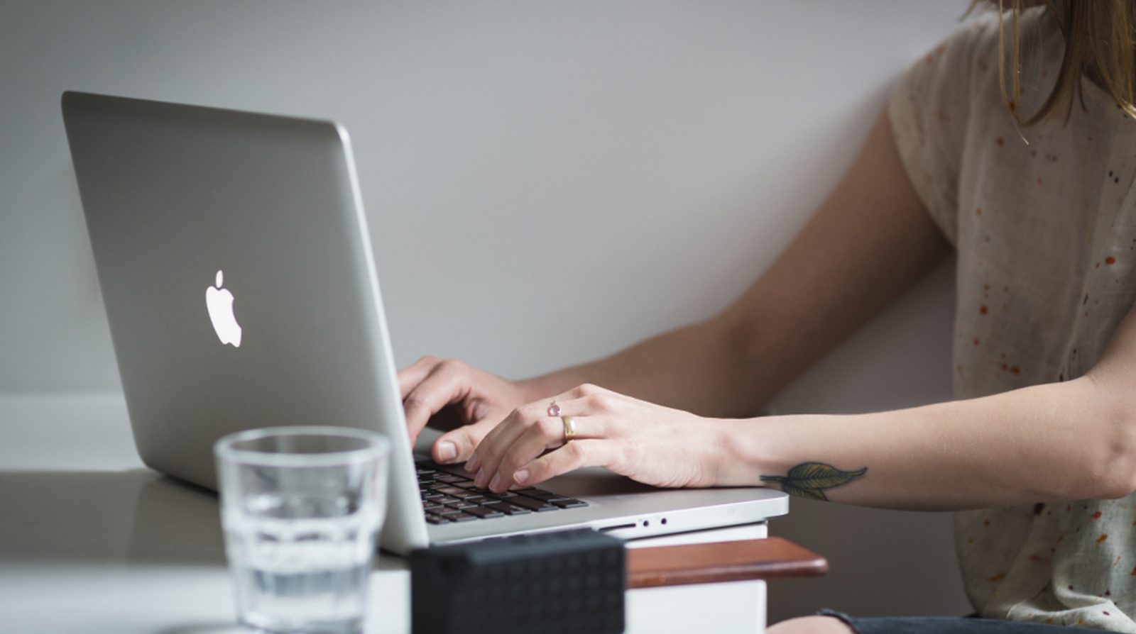 A person looking up information on a laptop