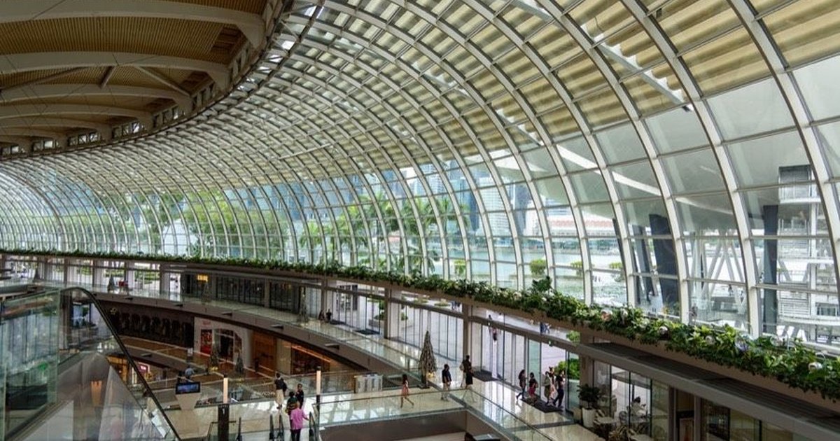 Dedicated editorial visual for From Jakarta to Ho Chi Minh City: retail returns to real life via experience hubs, with AI as the glue