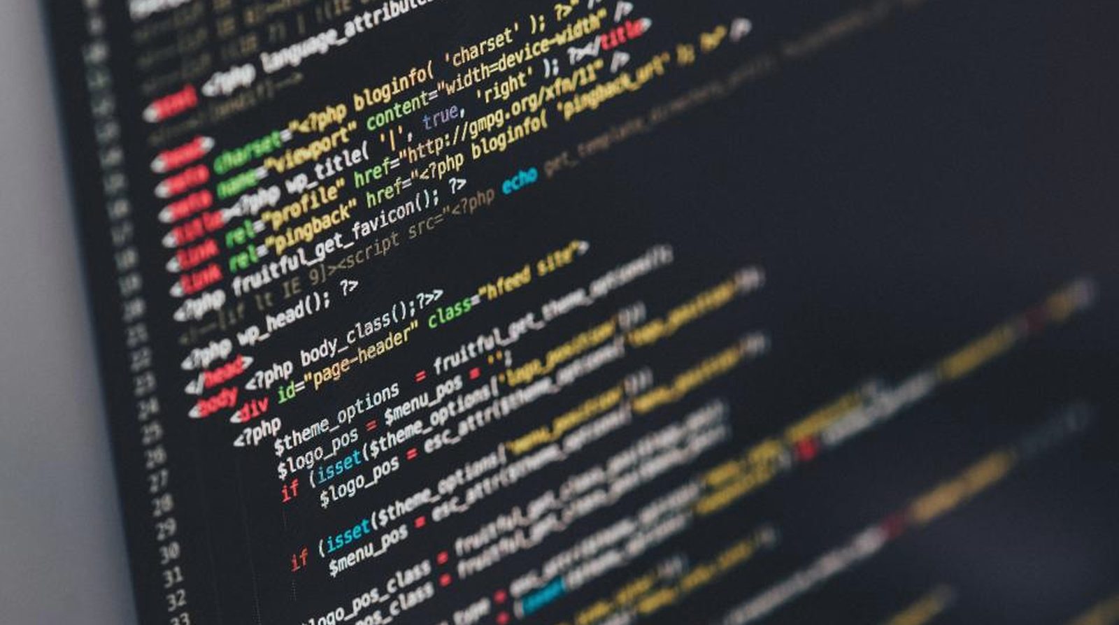 Computer screen showing source code while a developer integrates a messaging API